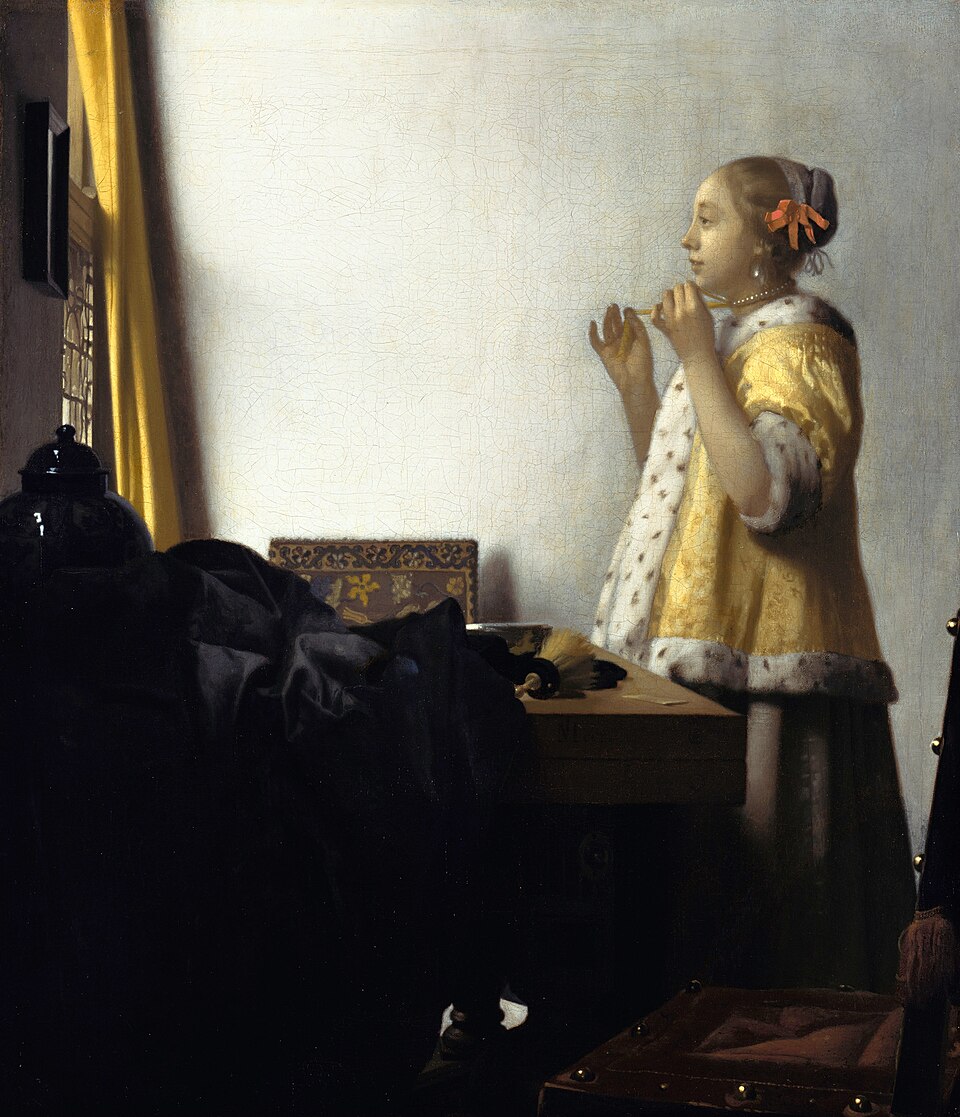 Woman with a Pearl Necklace - Johannes Vermeer