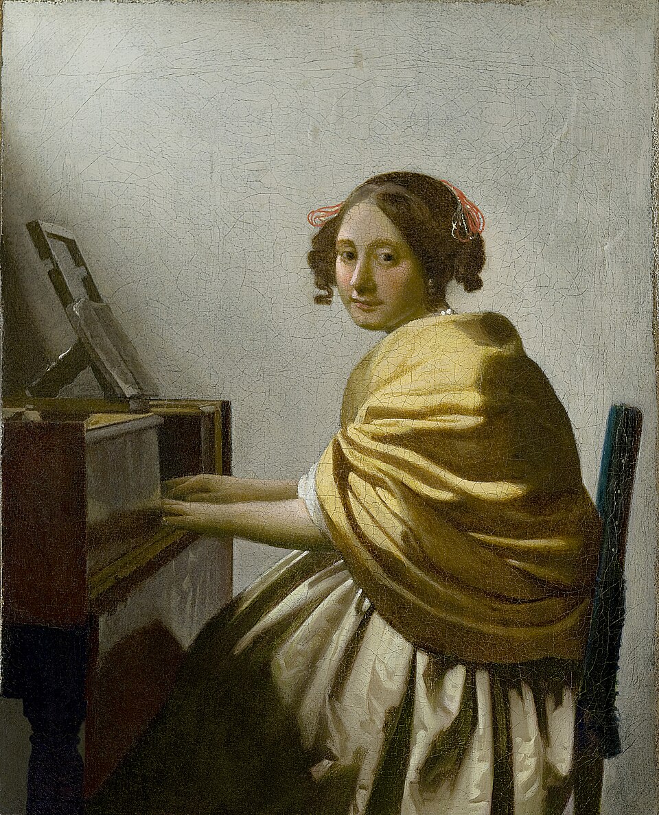 A Young Woman Seated at the Virginals - Johannes Vermeer